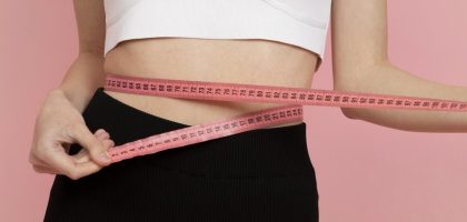 medium-shot-woman-measuring-herself